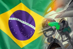 Car,With,A,Fuel,Injector,On,Brazil,Flag,Background.,Record